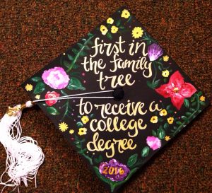 graduation cap that says "first in the family to receive a college degree."